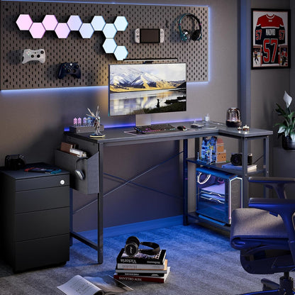Small Computer Desk with Power Outlets, 40 Inch L Shaped Desk with Reversible Shelves, Gaming Desk Corner Desk Study Writing Table for Home Office Bedroom Living Room, Black